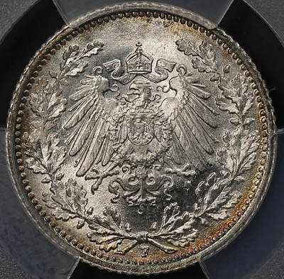 修遠堂世界钱币第110期 - PCGS MS66 1915年德国1/2马克银币，F厂铭，同一原卷头一次送评级都是67-68，这次送惨被压分，这枚绝不止66的状态，环彩