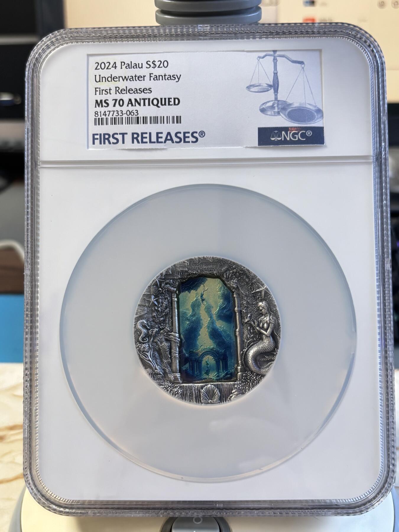 第197期拍卖 帕劳2024年水下幻想美人鱼3盎司银币NGC-MS70分首无盒证书，3盎司，发行777枚