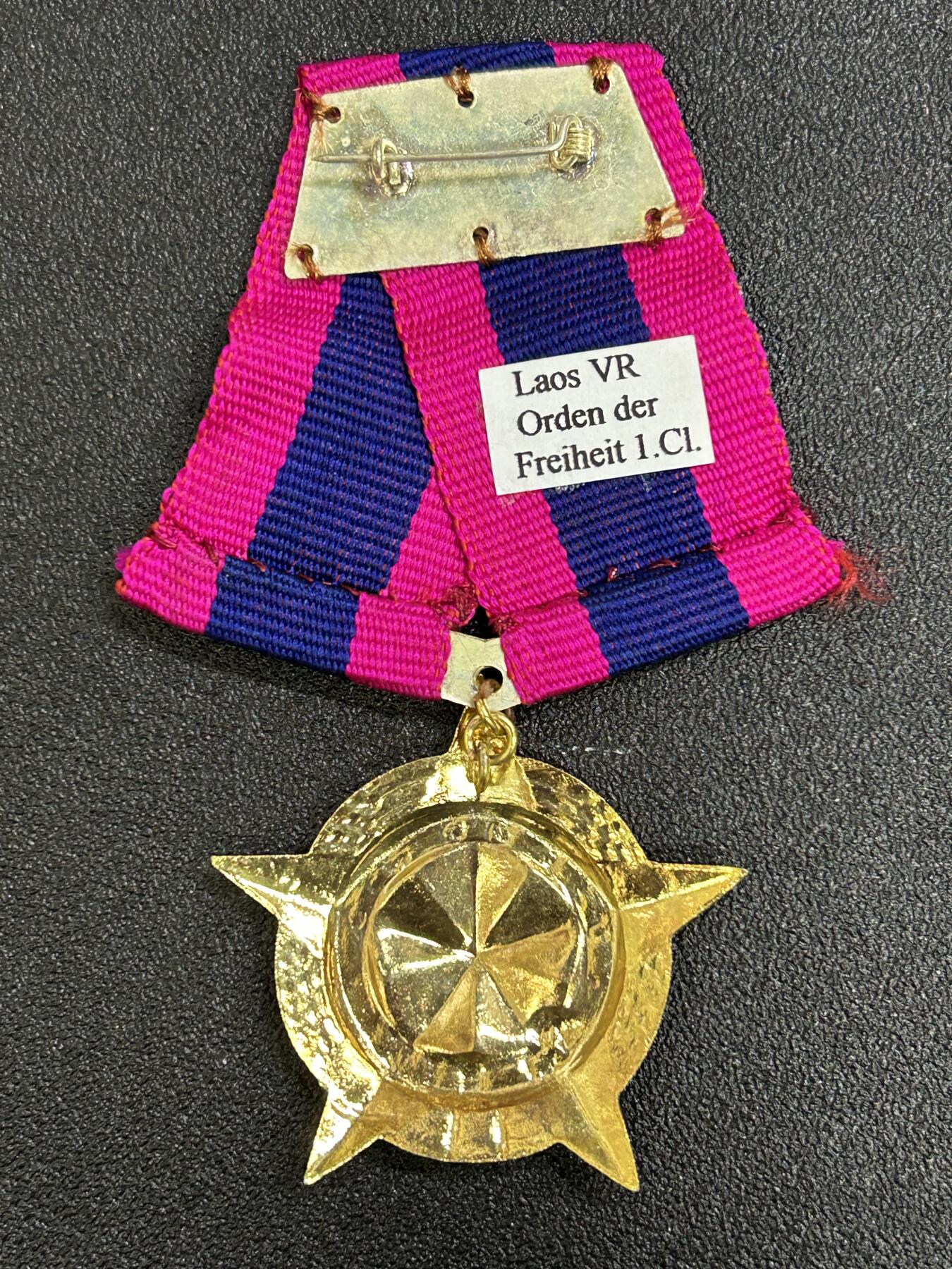 西秦中古拍卖第八十三期  老挝一级自由勋章 稀少第一版铜制