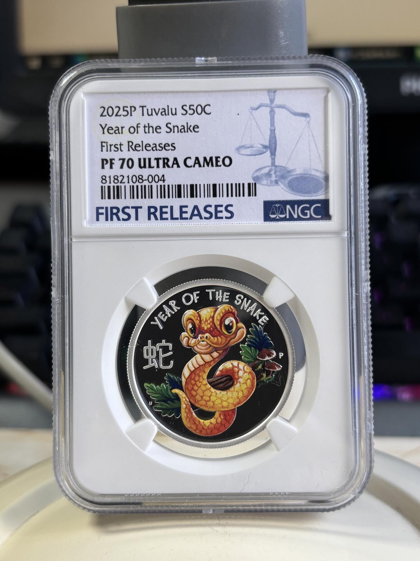 第197期拍卖 图瓦卢2025年中国生肖蛇宝宝彩银币NGC-PF70首无盒无证书，999银，15.55克，发行7500枚