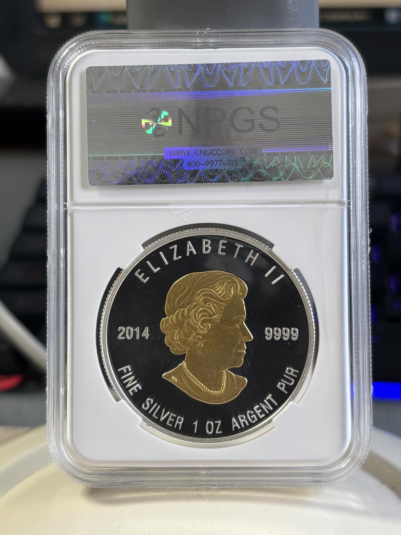 第197期拍卖 加拿大2014年神圣教义勇气的棕熊镀金银币NPGS保真，999银镀金，1盎司，银价584