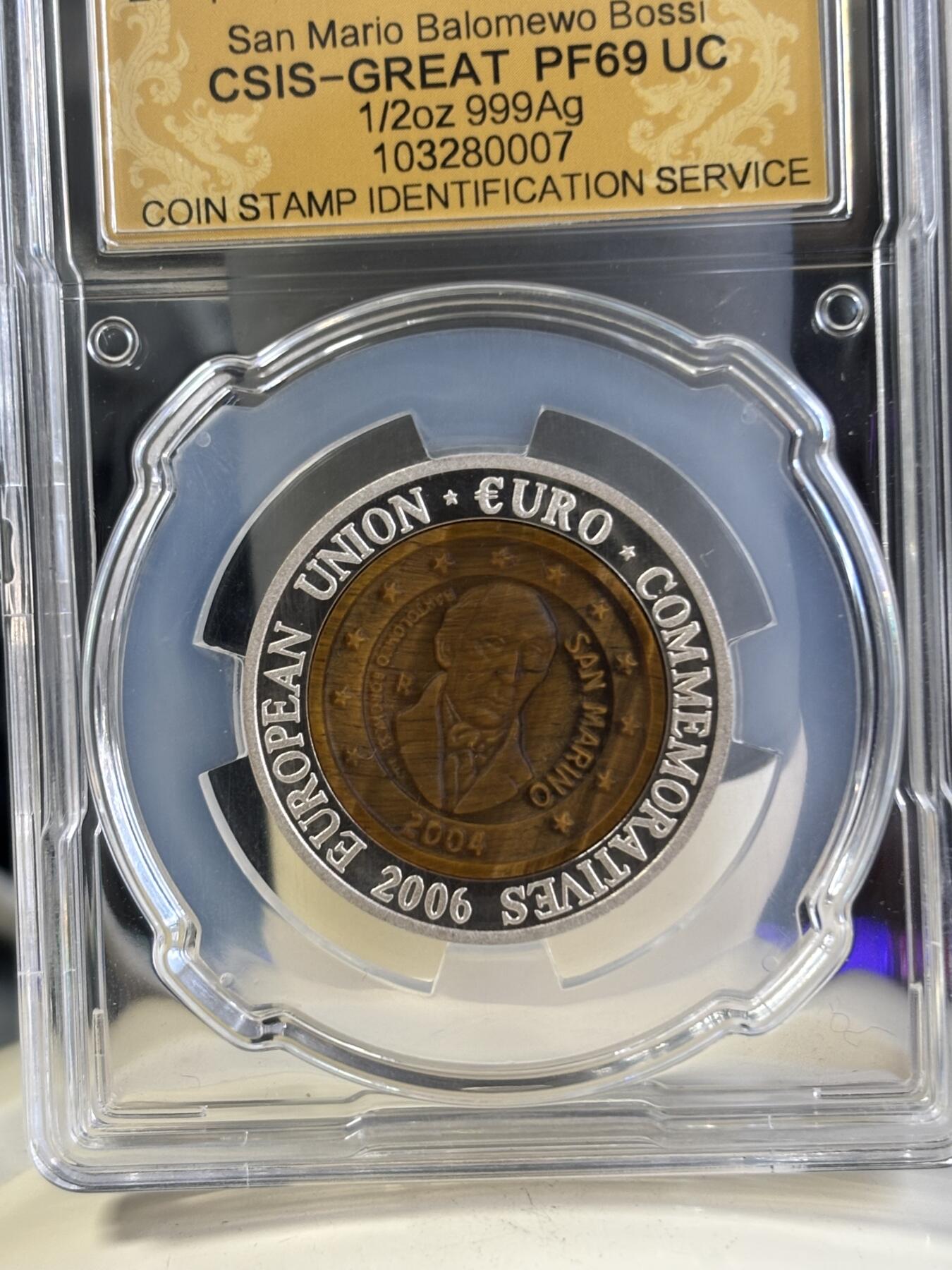 第197期拍卖 朝鲜2006年圣马力诺镶嵌虎眼石银币信泰评级69分，15.5克，发行3000枚