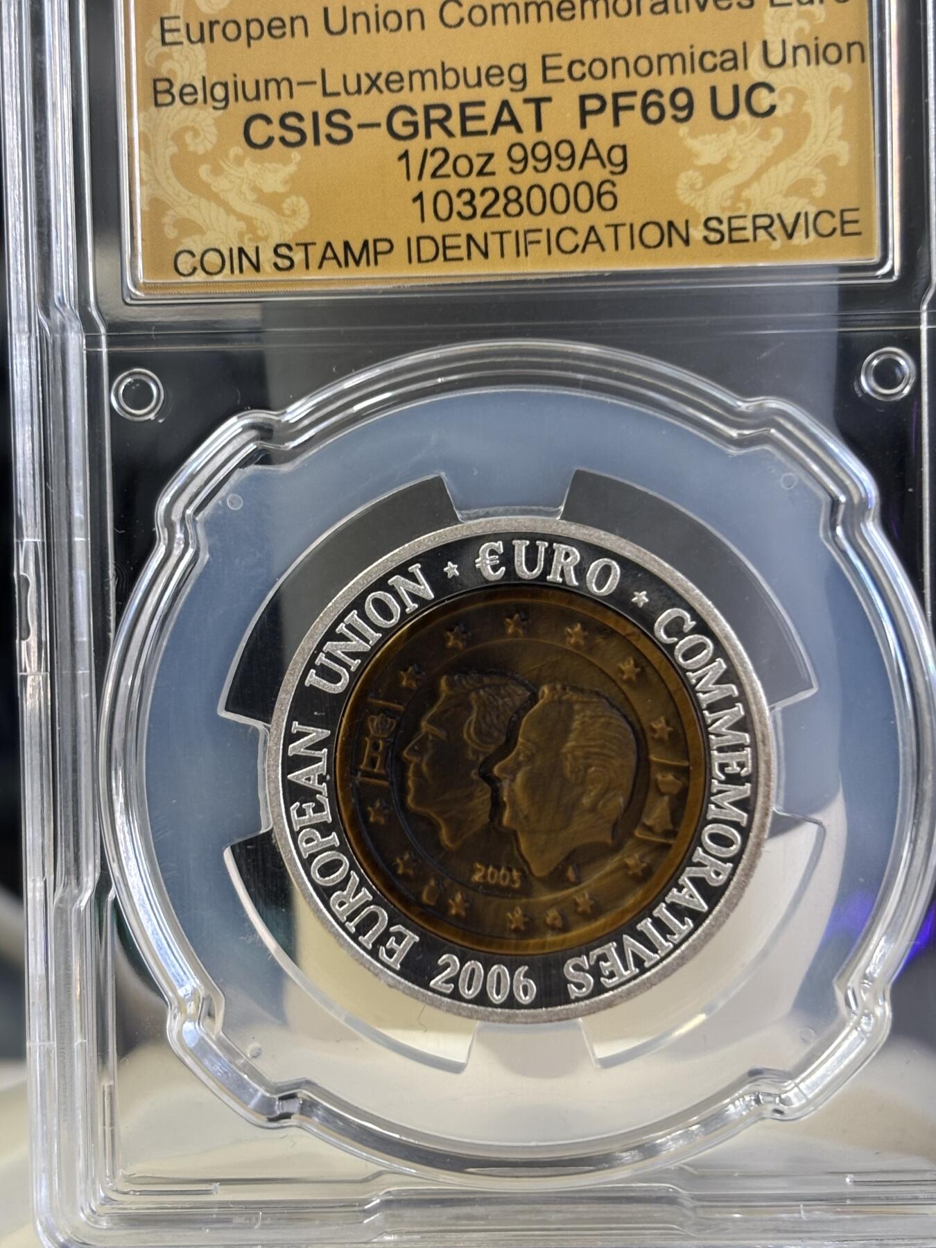 第197期拍卖 朝鲜2006年卢森堡镶嵌虎眼石纪念银币信泰评级69分，15.5克，发行3000枚