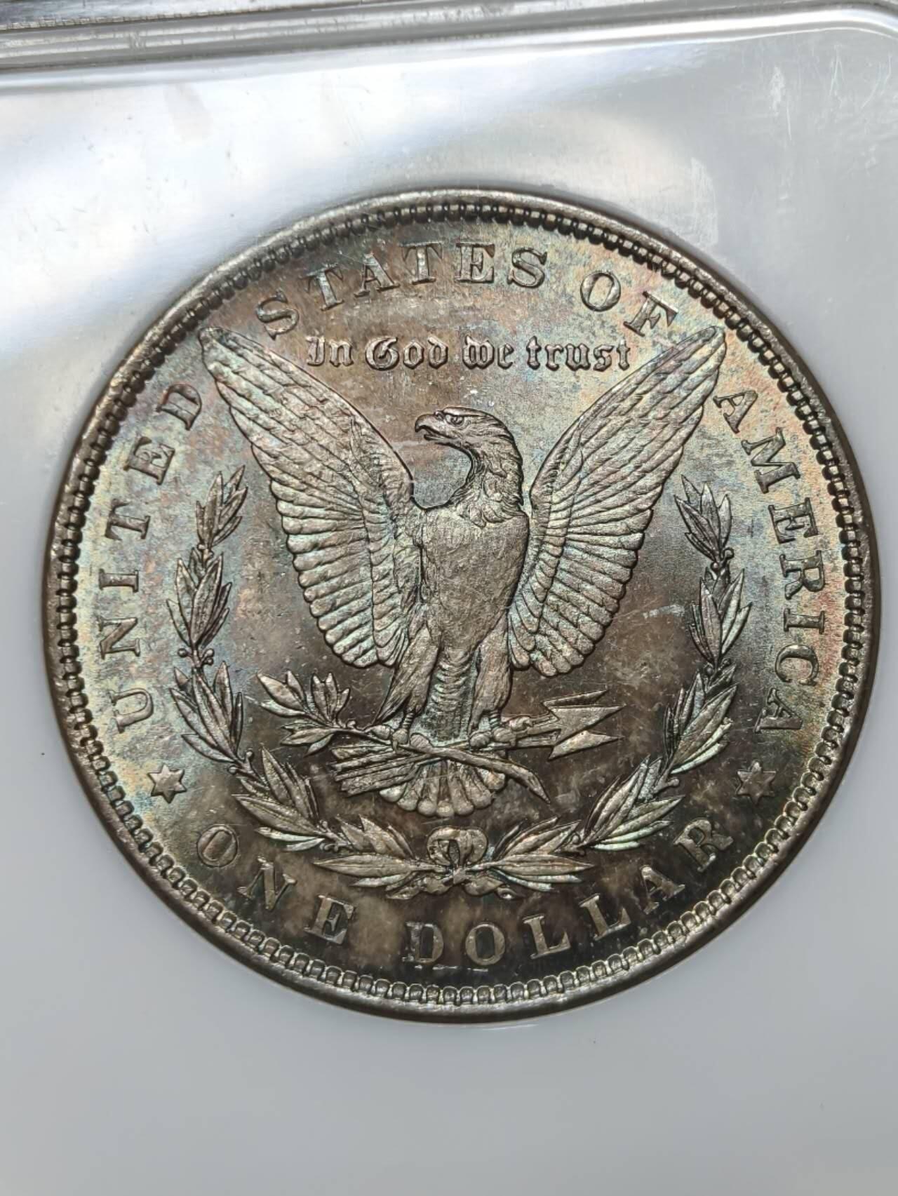 NGC评级MS64老盒严评1886年美国五彩摩根银元银币 最早的NGC评级盒之一，1开头6位数 五彩，实物状态非常好荧光蓝绿色