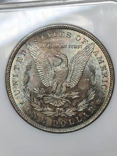 NGC评级MS64老盒严评1886年美国五彩摩根银元银币 最早的NGC评级盒之一，1开头6位数 五彩，实物状态非常好荧光蓝绿色 - NGC评级MS64老盒严评1886年美国五彩摩根银元银币 最早的NGC评级盒之一，1开头6位数 五彩，实物状态非常好荧光蓝绿色