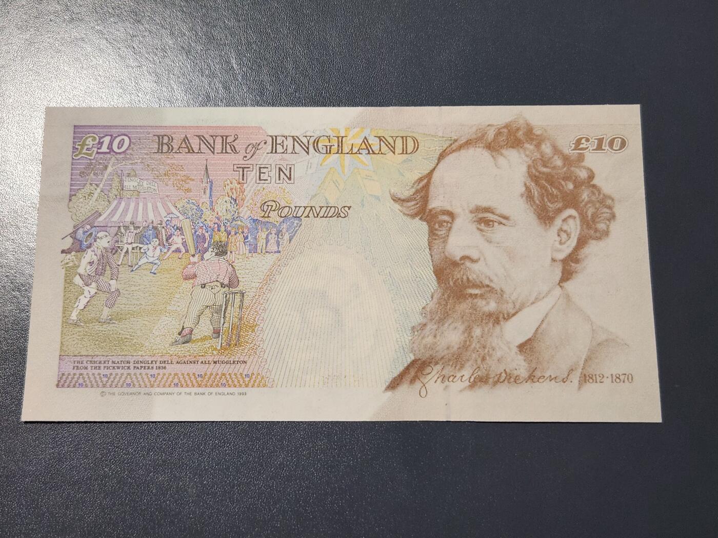 4月6号晚上8点 中外纸币自动截拍第52场 全新UNC 英国纸币10镑 E序列初版 狄更斯    M.Lowther签名 1999