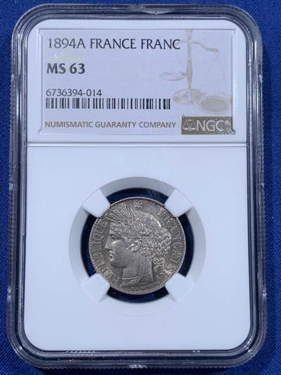 《竞宝斋》第477场 周日，周一 2场连拍 （全场包邮）欢迎送拍 - NGC MS63 法国1894A谷物女神1法郎银币 原光未流通，实物很好，背面有种很漂亮少见的靛蓝彩，难得好品。