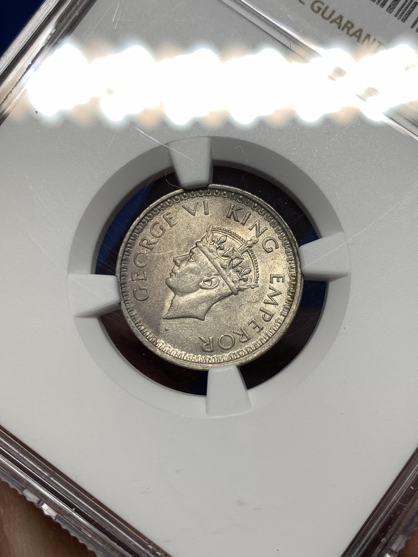 《竞宝斋》第477场 周日，周一 2场连拍 （全场包邮）欢迎送拍 NGC UNC 1945英属印度1/4卢比银币，少见小面值
