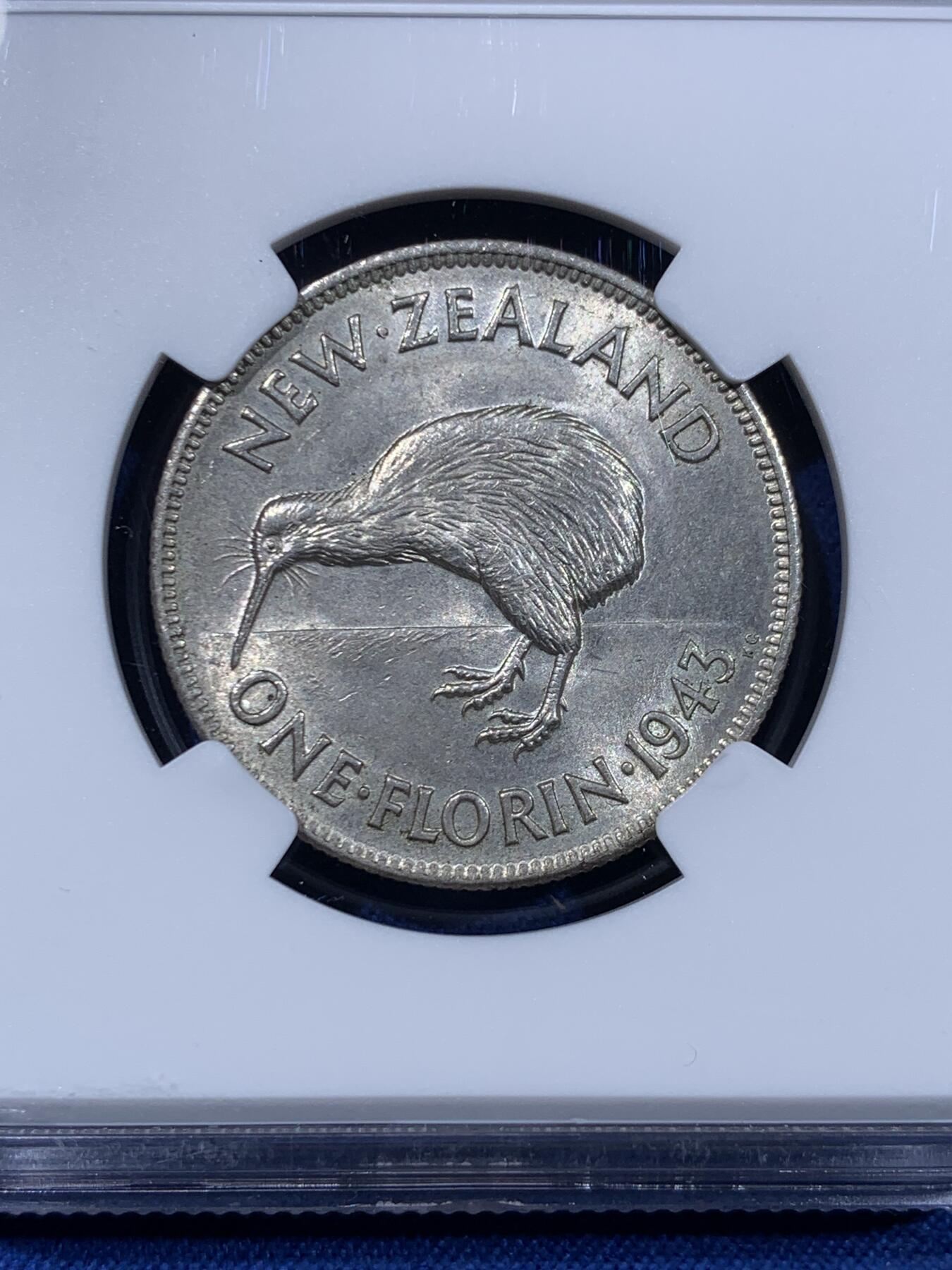 《竞宝斋》第477场 周日，周一 2场连拍 （全场包邮）欢迎送拍 NGC MS62 新西兰1943年几维鸟1弗洛林银币，转光强烈，该品种ms少见