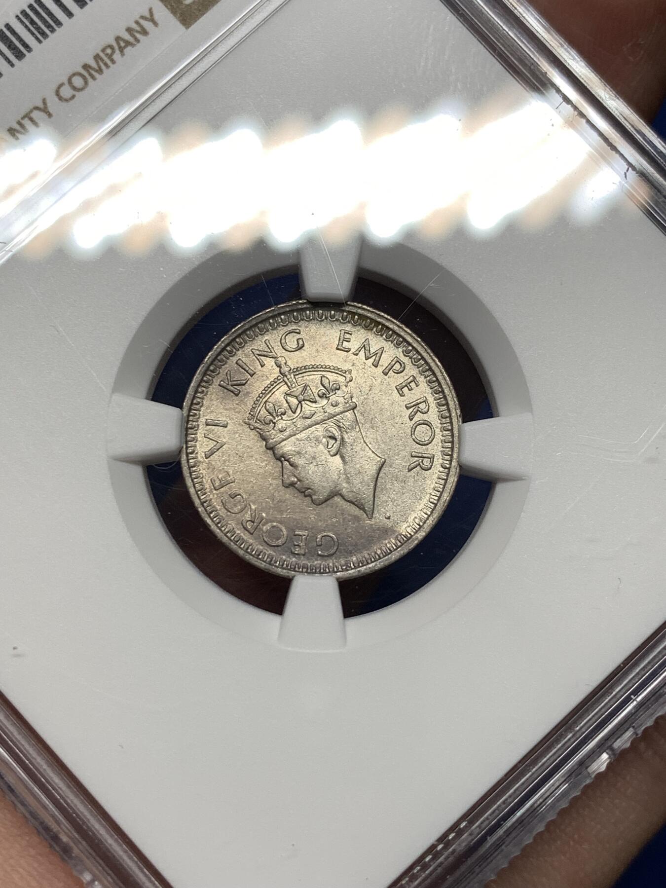 《竞宝斋》第477场 周日，周一 2场连拍 （全场包邮）欢迎送拍 NGC UNC 1945英属印度1/4卢比银币，少见小面值