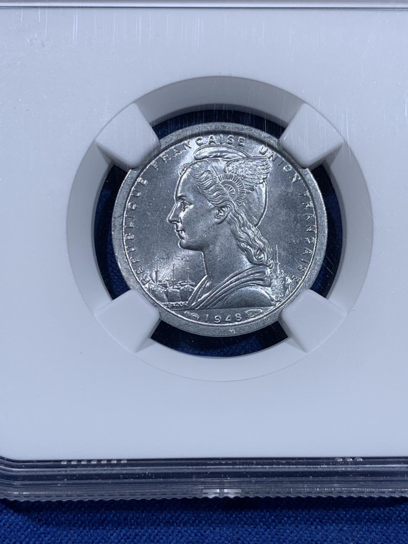 《竞宝斋》第477场 周日，周一 2场连拍 （全场包邮）欢迎送拍 NGC MS63 法属圣皮埃尔和密克隆1948年1法郎铝币 法属殖民地钱币背面设计各不相同，可供凑套收集，铝币高分好品难得