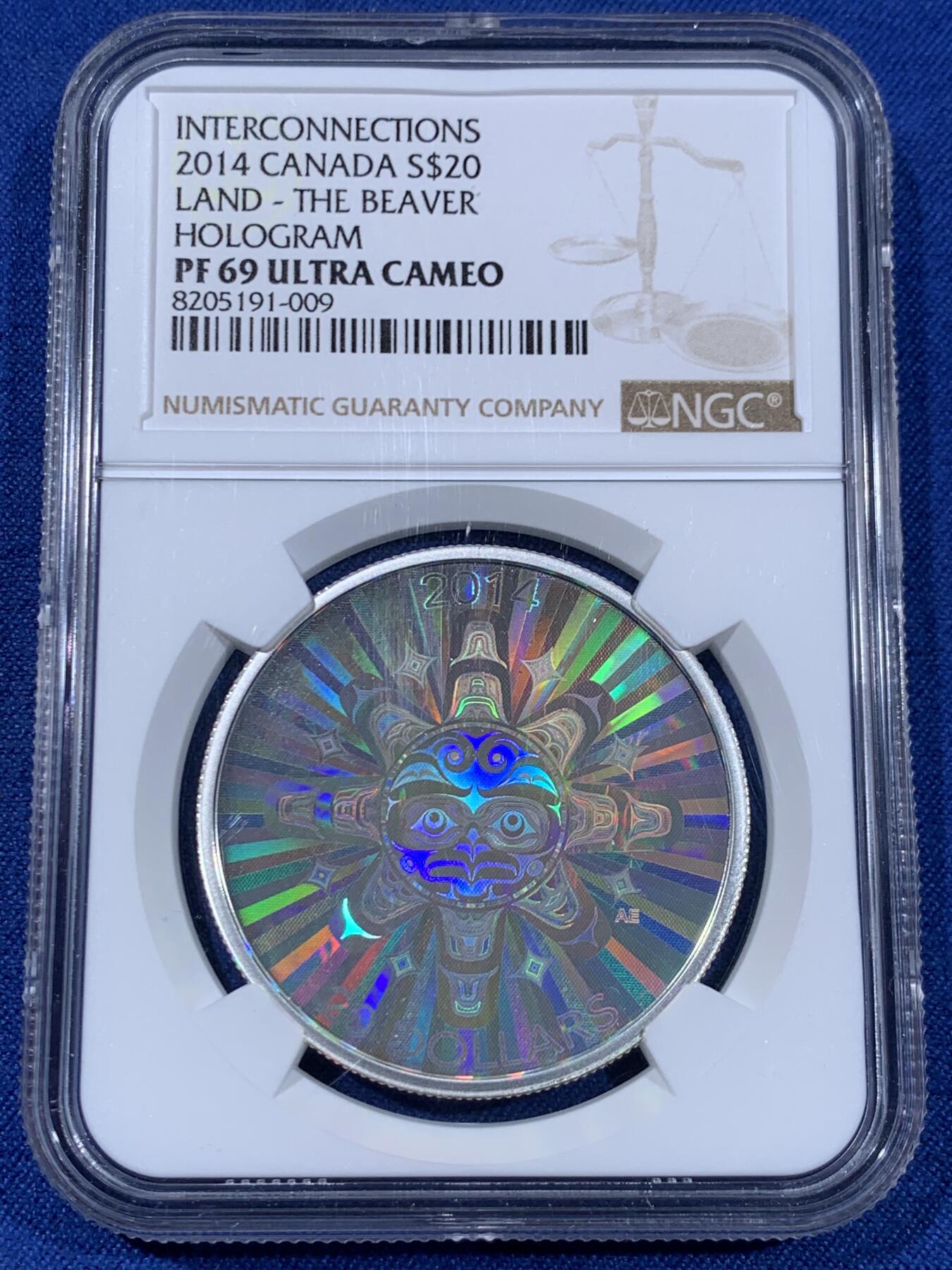 《竞宝斋》第477场 周日，周一 2场连拍 （全场包邮）欢迎送拍 NGC PF69UC 加拿大2014年“海狸”原住民文化系列一盎司银币，系列第一枚，镜面高浮雕，全息幻彩。以原住民艺术风格描绘了海狸形象，并结合全息幻彩技术呈现出绚丽的视觉效果，是兼具艺术与技术的现代纪念银币。
