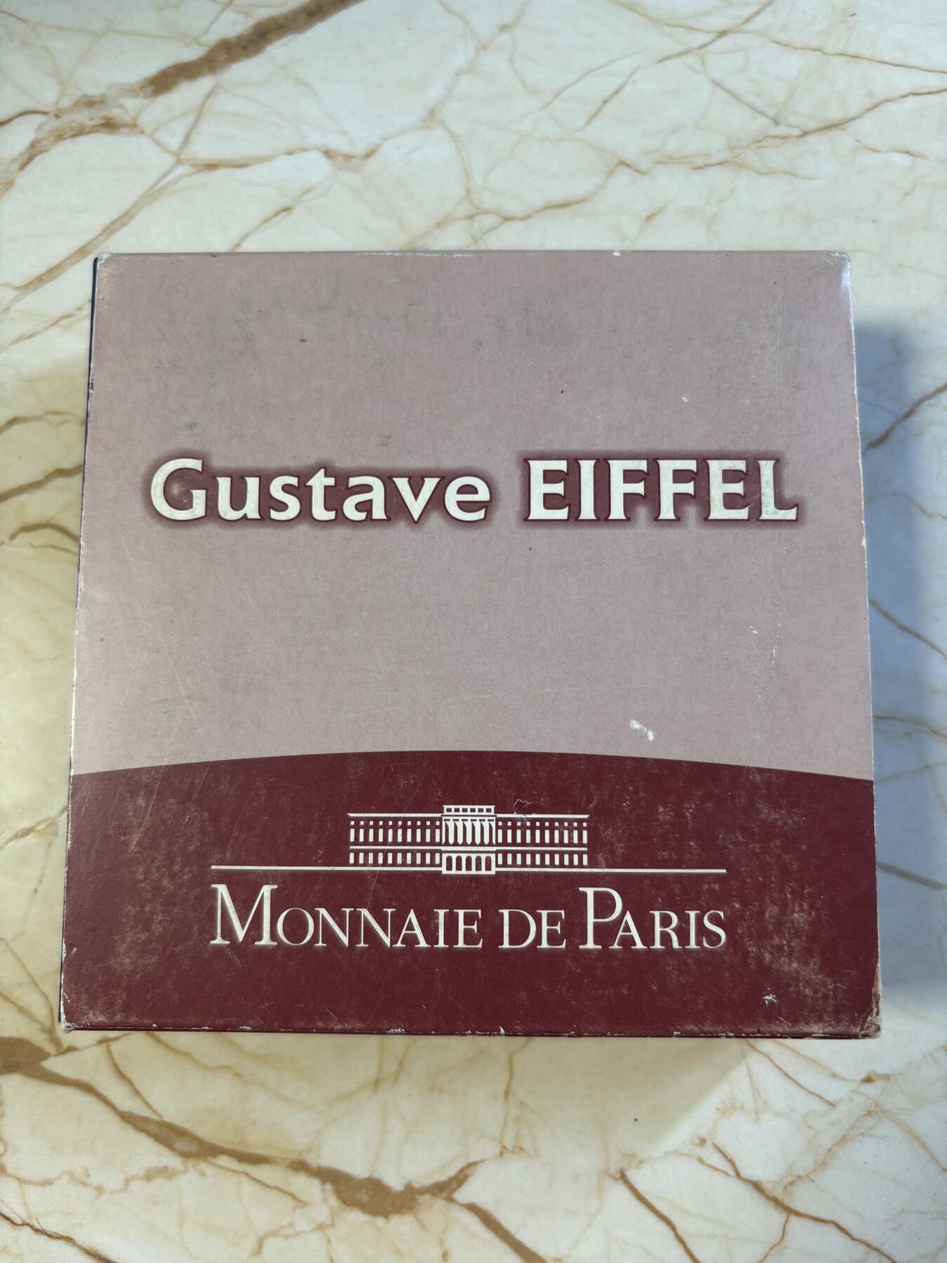 第197期拍卖 法国2009年巴黎埃菲尔铁塔120周年5盎司加厚银币，950银，163.8克，发行1000枚，塑料盒有裂痕