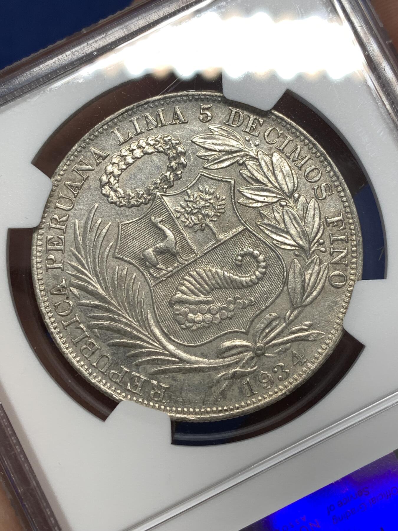 《竞宝斋》第477场 周日，周一 2场连拍 （全场包邮）欢迎送拍 NGC AUD 秘鲁1934年坐人女神1索尔银币