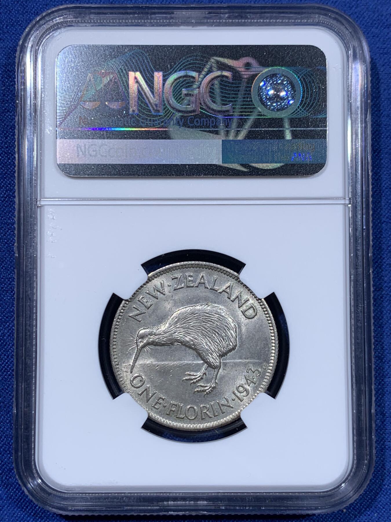 《竞宝斋》第477场 周日，周一 2场连拍 （全场包邮）欢迎送拍 NGC MS62 新西兰1943年几维鸟1弗洛林银币，转光强烈，该品种ms少见