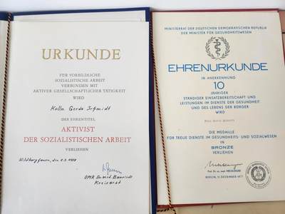 南水社第5次拍卖   东德卫生系统 Gerda Schmidt 红十字忠诚服务与社会主义劳动积极分子证书证书奖章一套 是上面那位得主的妻子