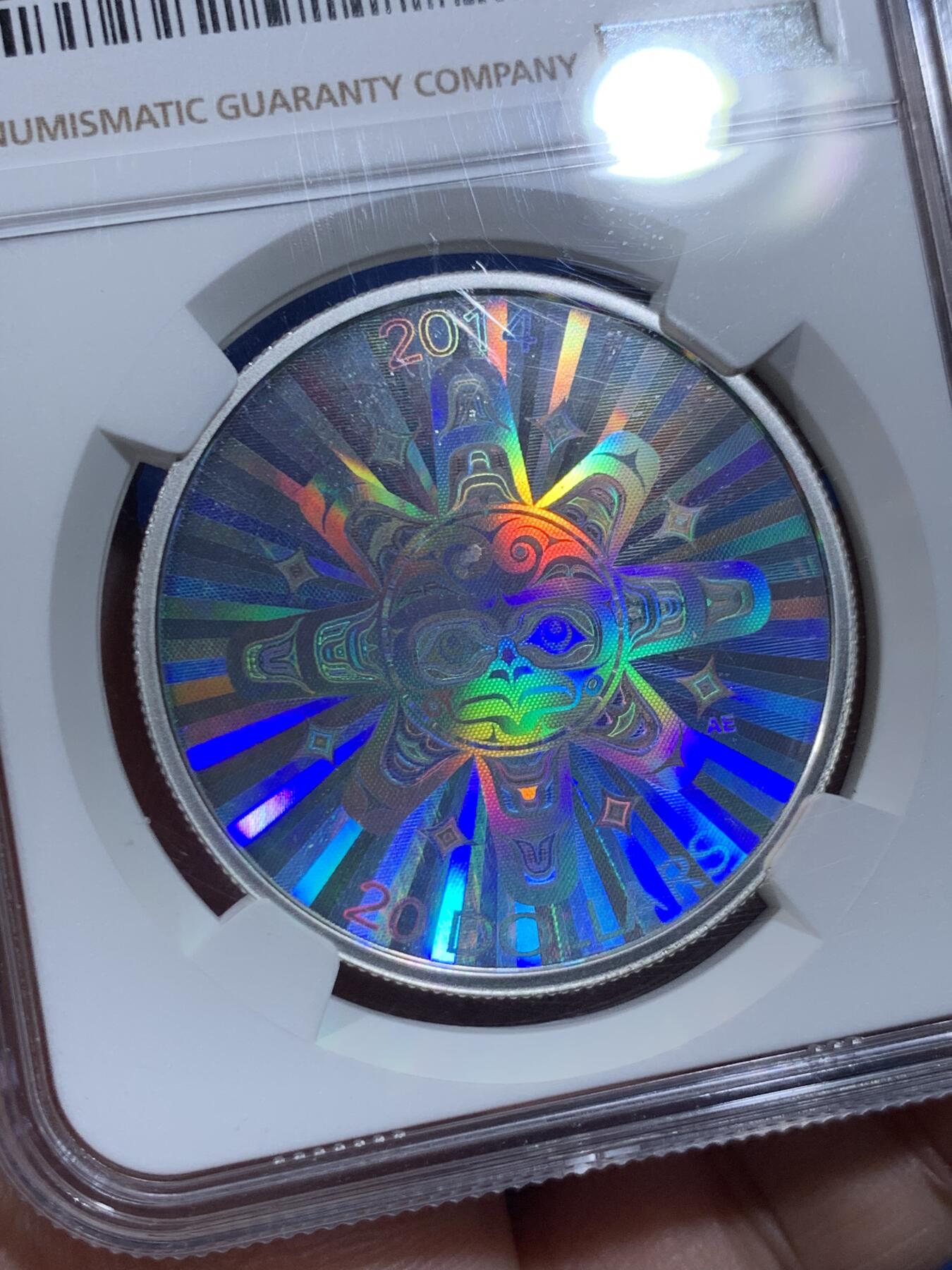 《竞宝斋》第477场 周日，周一 2场连拍 （全场包邮）欢迎送拍 NGC PF69UC 加拿大2014年“海狸”原住民文化系列一盎司银币，系列第一枚，镜面高浮雕，全息幻彩。以原住民艺术风格描绘了海狸形象，并结合全息幻彩技术呈现出绚丽的视觉效果，是兼具艺术与技术的现代纪念银币。