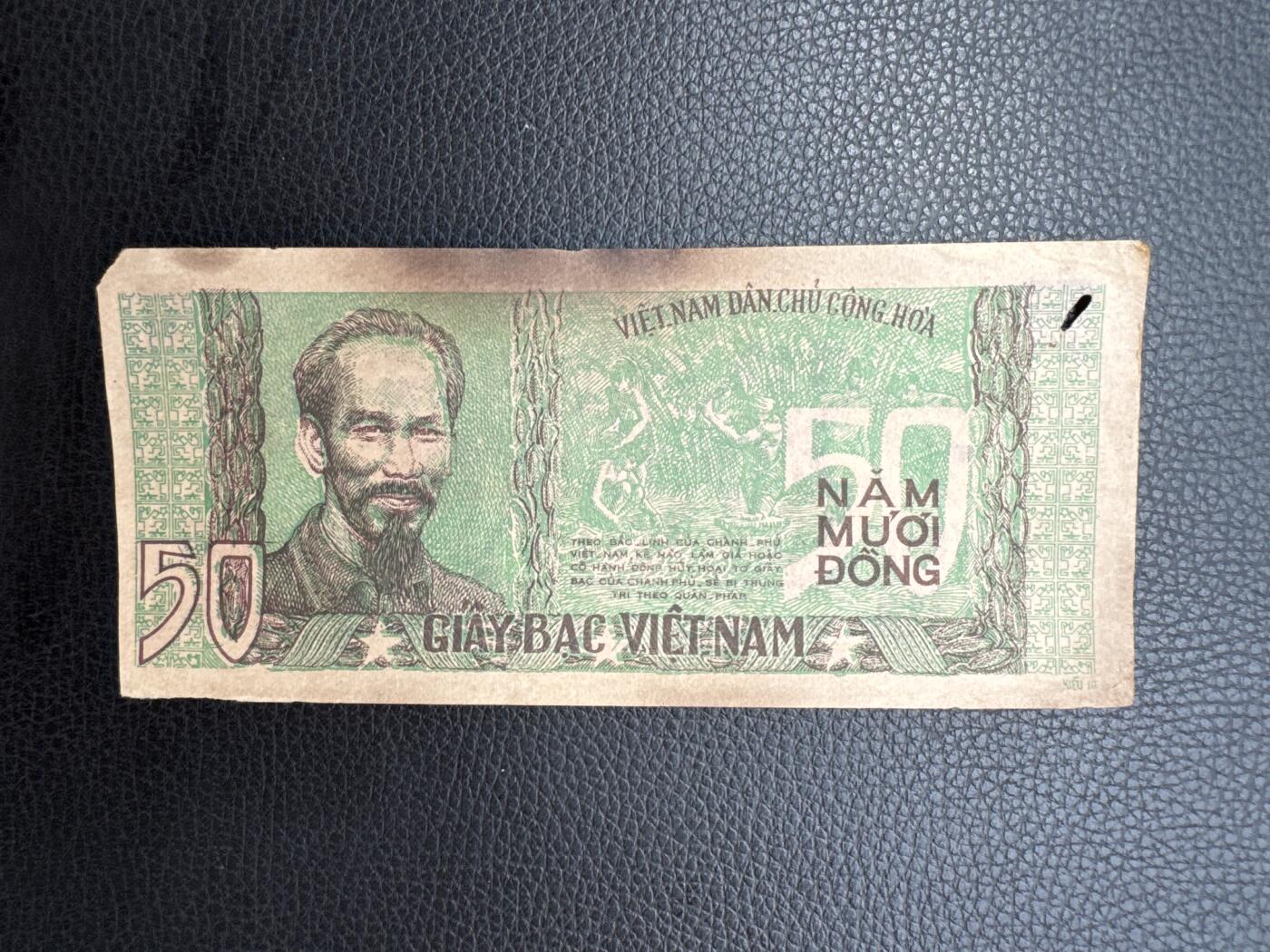 桂P钱币文化工作室拍卖第四十九期 越南民主共和国早期草纸票50元，著名的胡志明微笑，少见品种