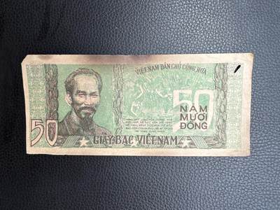 桂P钱币文化工作室拍卖第四十九期 - 越南民主共和国早期草纸票50元，著名的胡志明微笑，少见品种