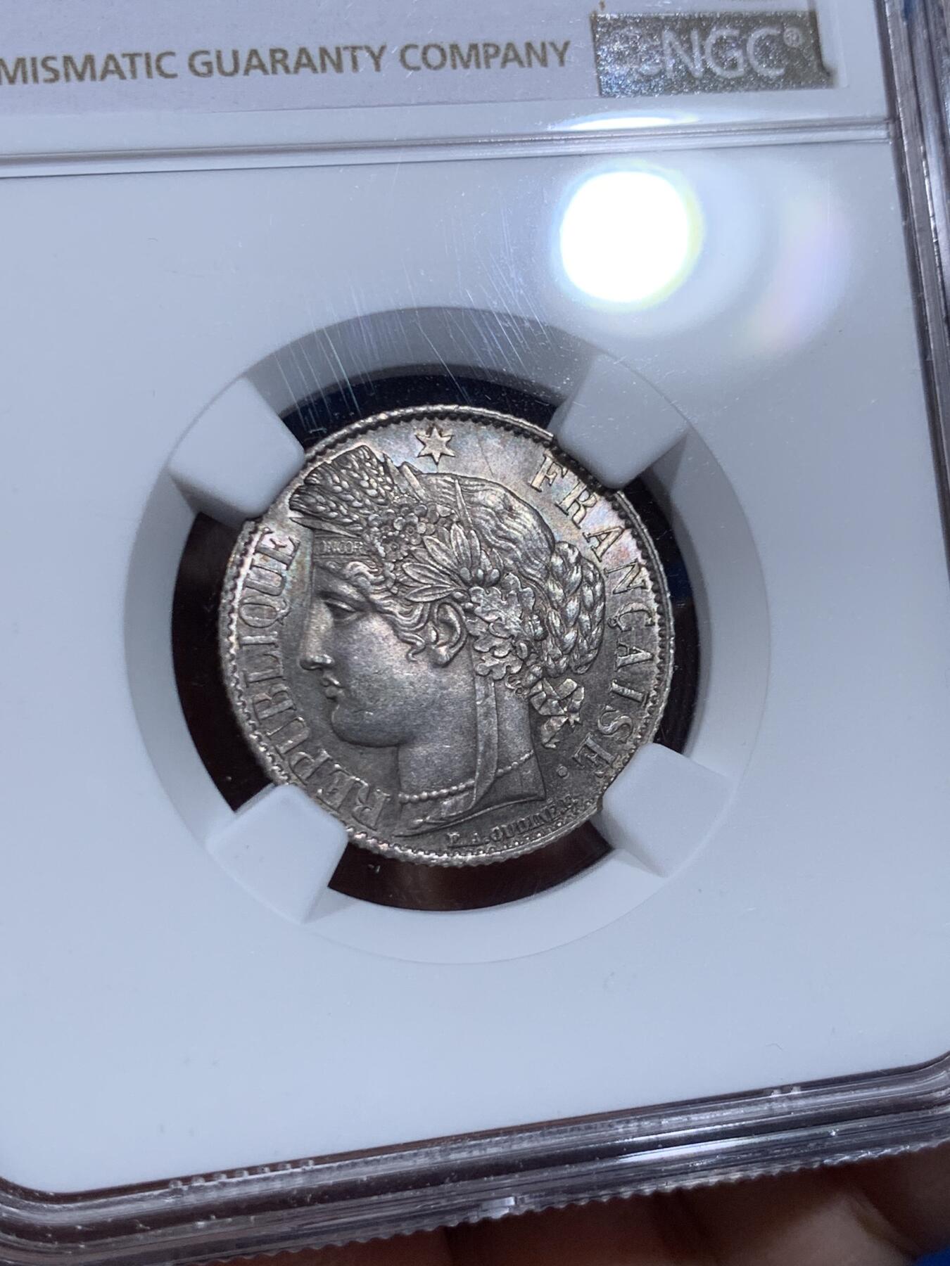 《竞宝斋》第477场 周日，周一 2场连拍 （全场包邮）欢迎送拍 NGC MS63 法国1894A谷物女神1法郎银币 原光未流通，实物很好，背面有种很漂亮少见的靛蓝彩，难得好品。