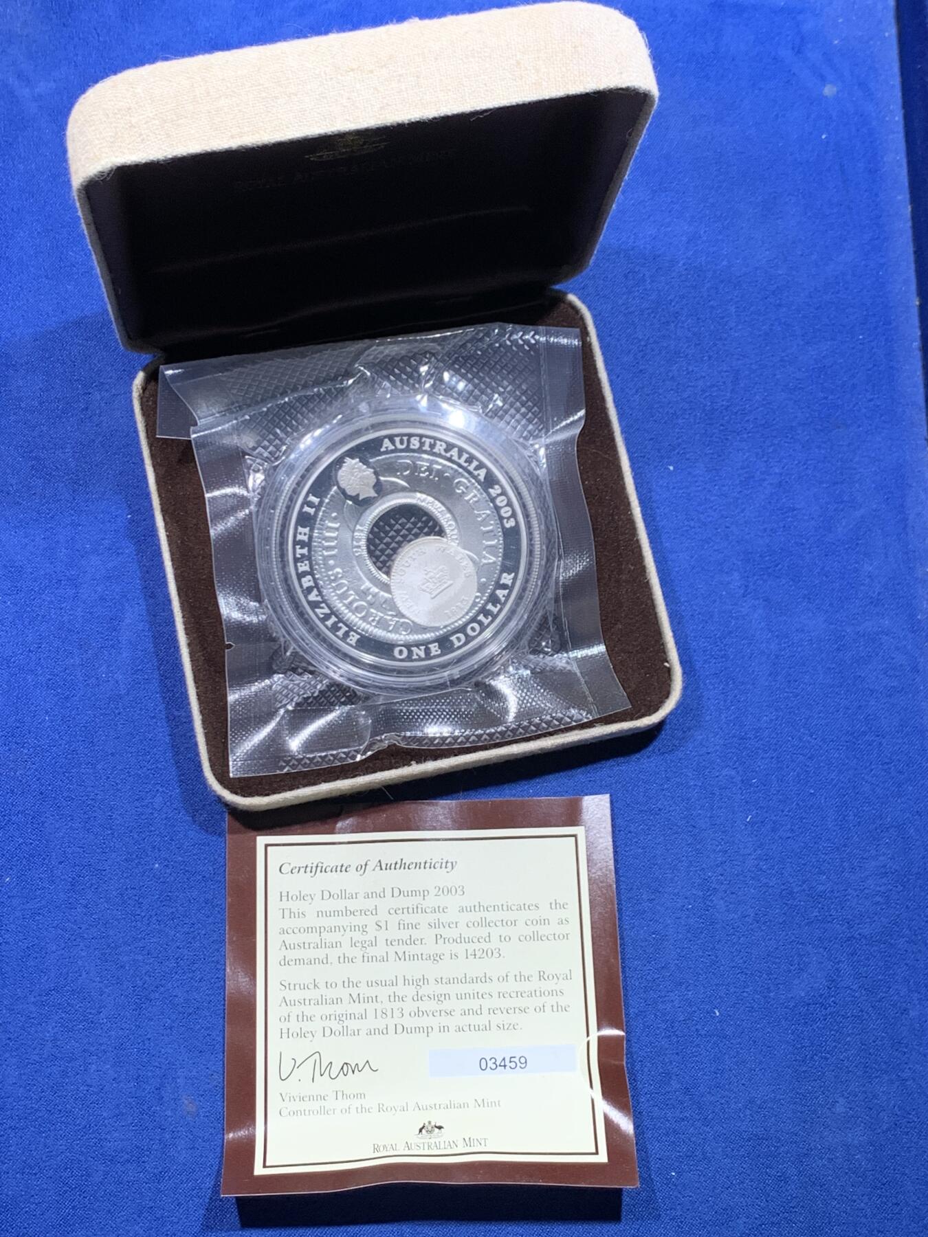 《竞宝斋》第478场 周日，周一 2场连拍 （全场包邮）欢迎送拍 澳大利亚2003年1元镂空精制银币 通孔银元和内芯 54.3克999银 发行量14203枚 盒证全