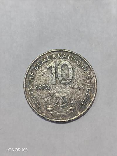 纪念章/纪念币 - 1973年民主德国（东德）10马克 第十届世界青年与学生联欢节纪念币1973年，第十届世界青年与学生联欢节在东柏林举办，这是冷战时期社会主义阵营规模最大的青年盛会，东德为纪念该活动发行了此枚10马克纪念币，是东德最具代表性的纪念币之一。