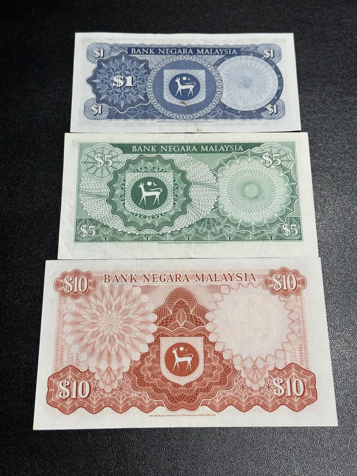 《外钞收藏家》第六百二十四期（精品场）（长期征集拍品、欢迎藏友们联系合作） 马来西亚1、5、10林吉特 三张一起 AU品相和UNC-