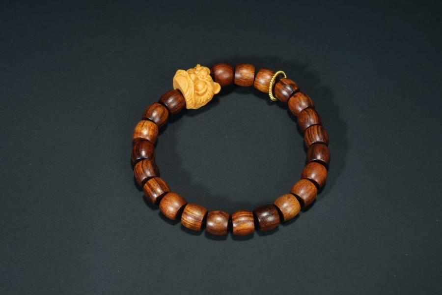 上海都达杂项专场六十八【全场包邮】 海南黄花梨虎皮纹桶珠醒狮手串 附鉴定证书95-291