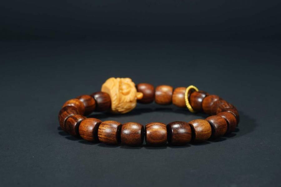 上海都达杂项专场六十八【全场包邮】 海南黄花梨虎皮纹桶珠醒狮手串 附鉴定证书95-291