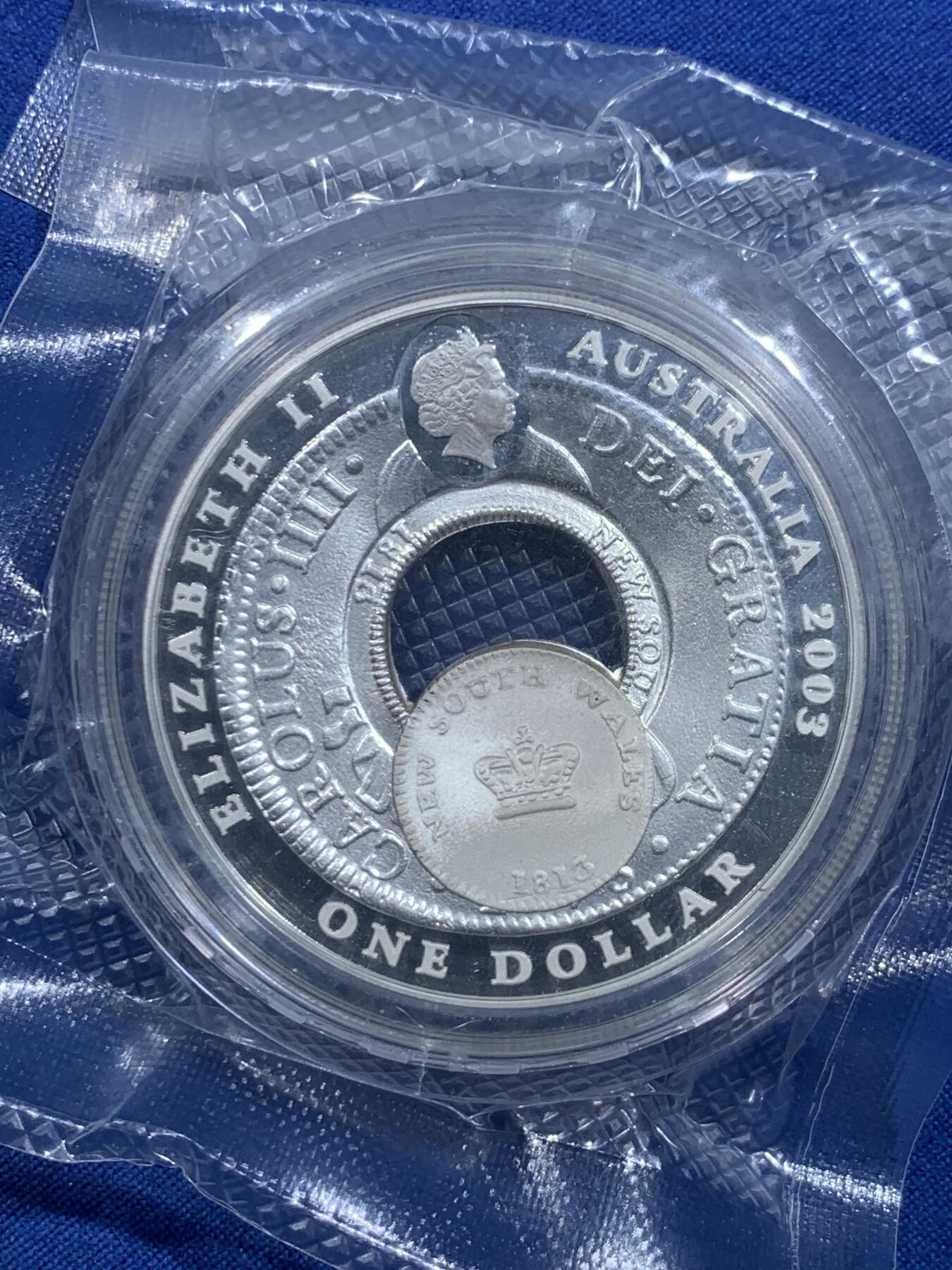 《竞宝斋》第478场 周日，周一 2场连拍 （全场包邮）欢迎送拍 澳大利亚2003年1元镂空精制银币 通孔银元和内芯 54.3克999银 发行量14203枚 盒证全