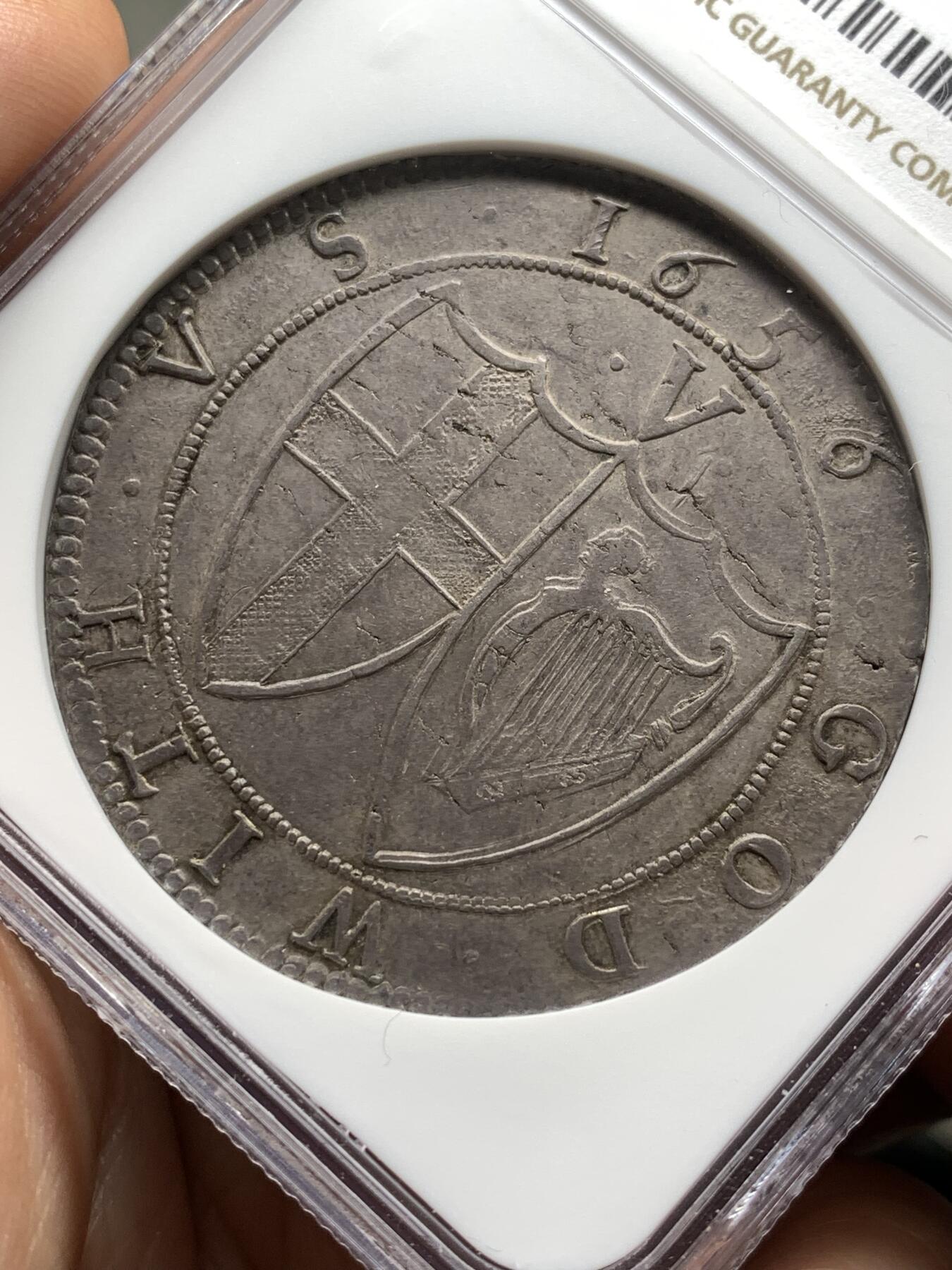 《竞宝斋》第478场 周日，周一 2场连拍 （全场包邮）欢迎送拍 NGC MS61 英国1656/4骑字commonwealth克朗，英国共和时期发行，少有的几种没有君主头像的英国钱币，大名誉品，最近成交感觉有锉痕的拍卖7200刀 本次的这枚明显好很多