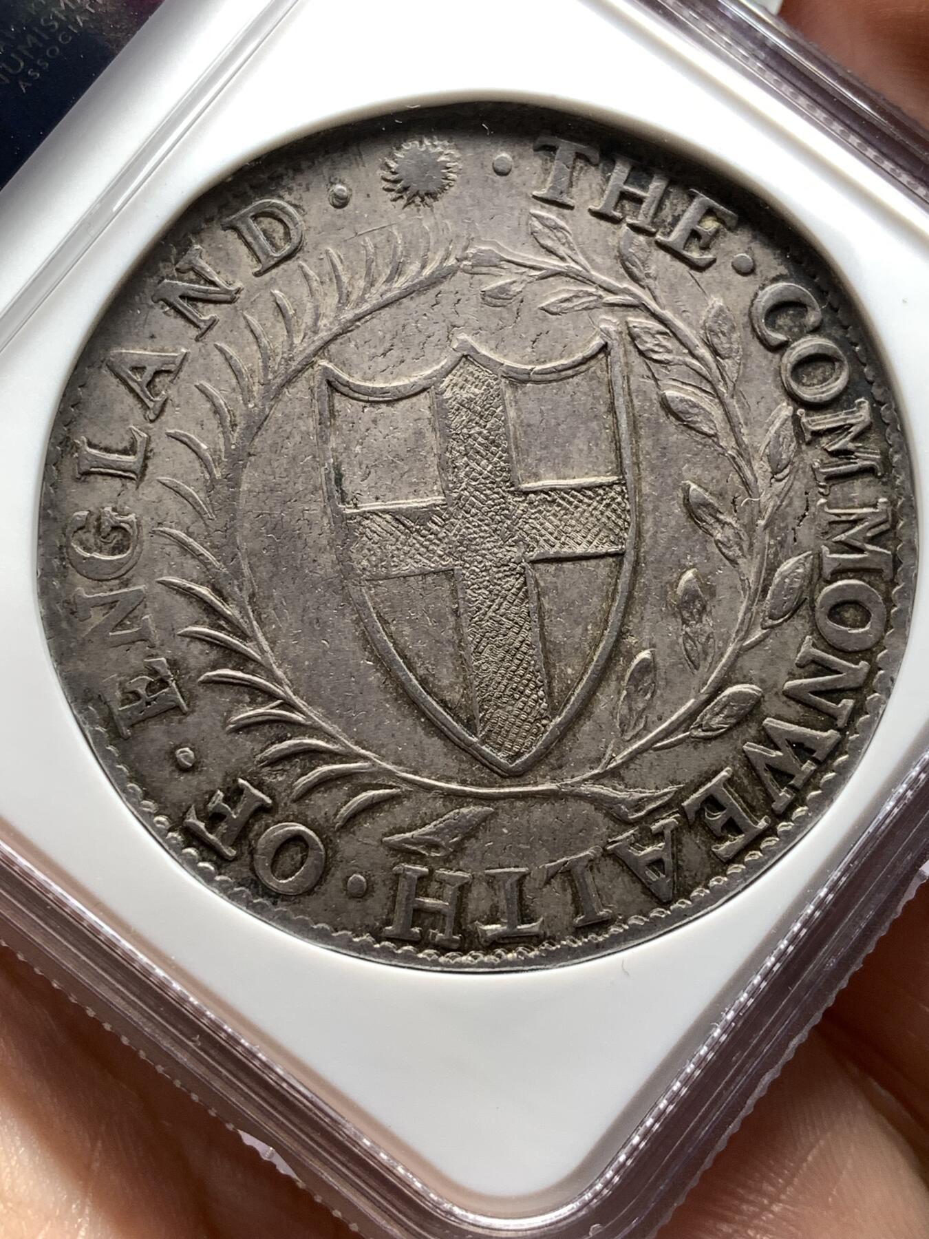 《竞宝斋》第478场 周日，周一 2场连拍 （全场包邮）欢迎送拍 NGC MS61 英国1656/4骑字commonwealth克朗，英国共和时期发行，少有的几种没有君主头像的英国钱币，大名誉品，最近成交感觉有锉痕的拍卖7200刀 本次的这枚明显好很多