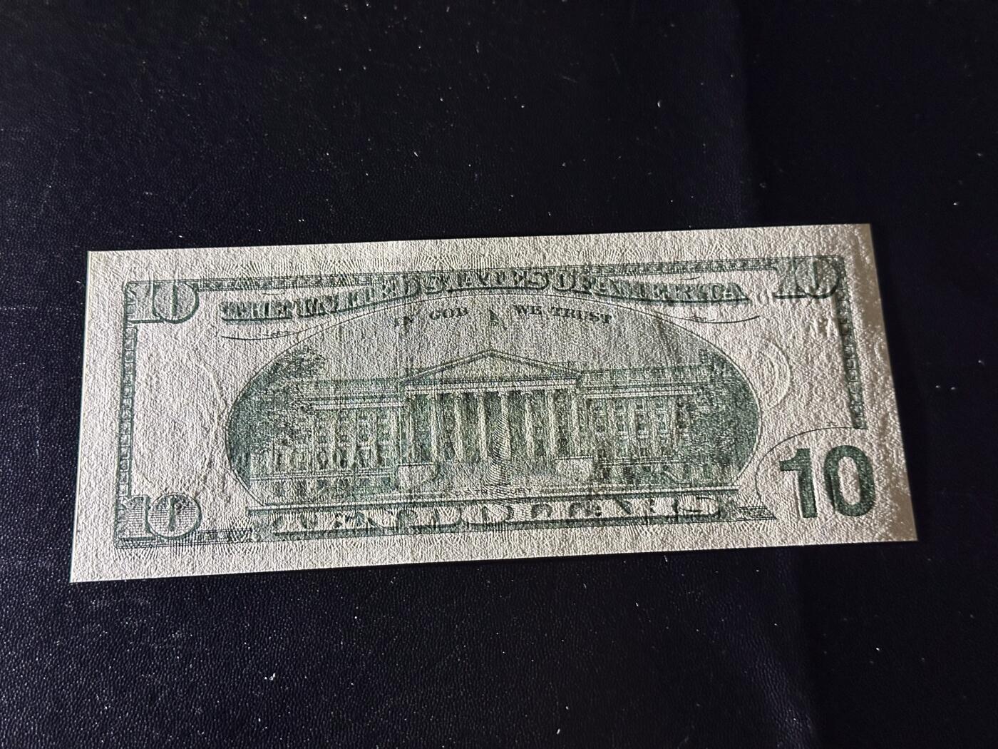 《外钞收藏家》第六百二十四期（精品场）（长期征集拍品、欢迎藏友们联系合作） 2003年美国大头版10美元 补号 万位号 全新UNC