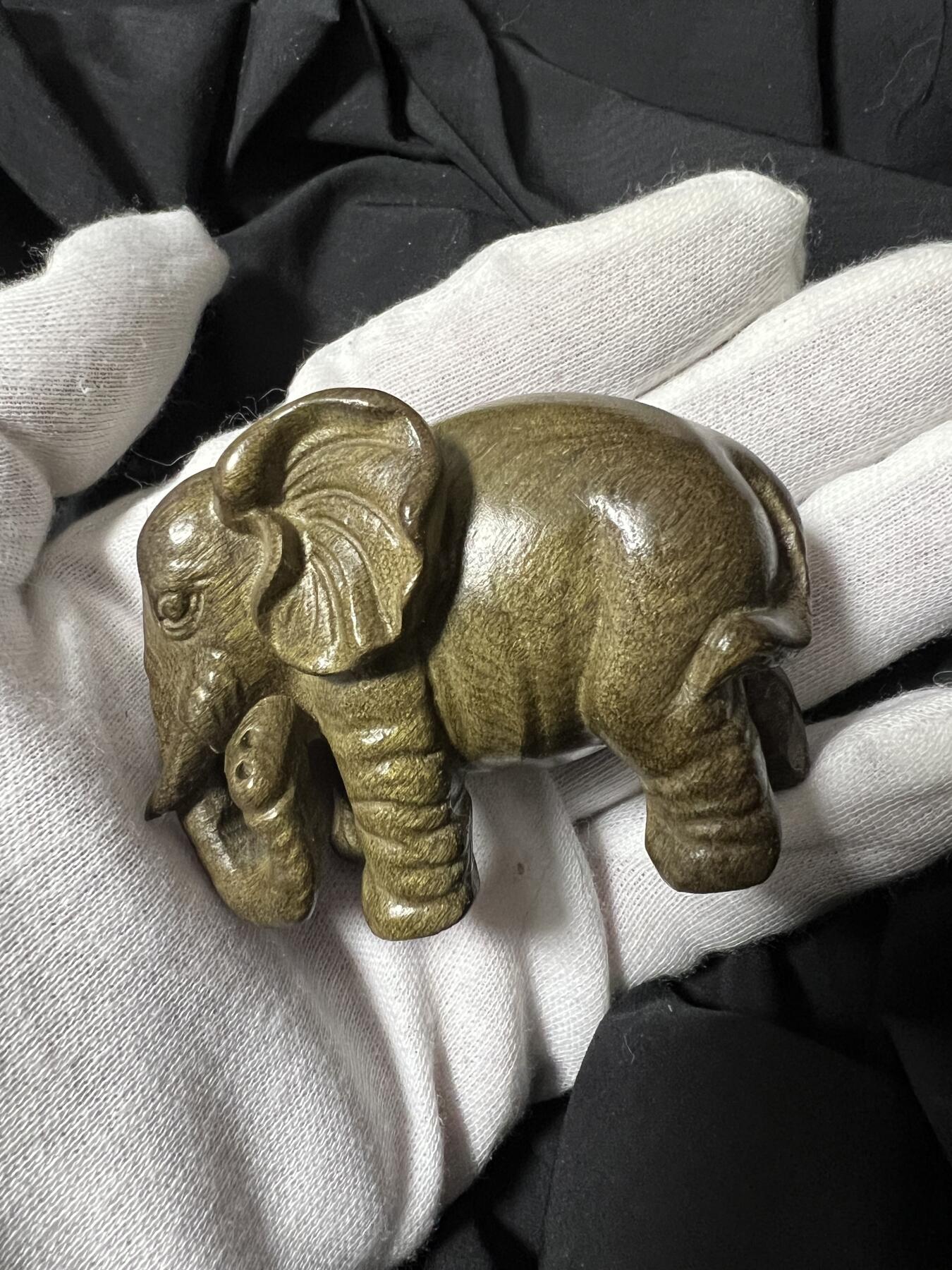 零元拍：金丝楠 阴沉木 太平有象 雕件手把件，满手留香金丝流溢。67/38/48.5MM