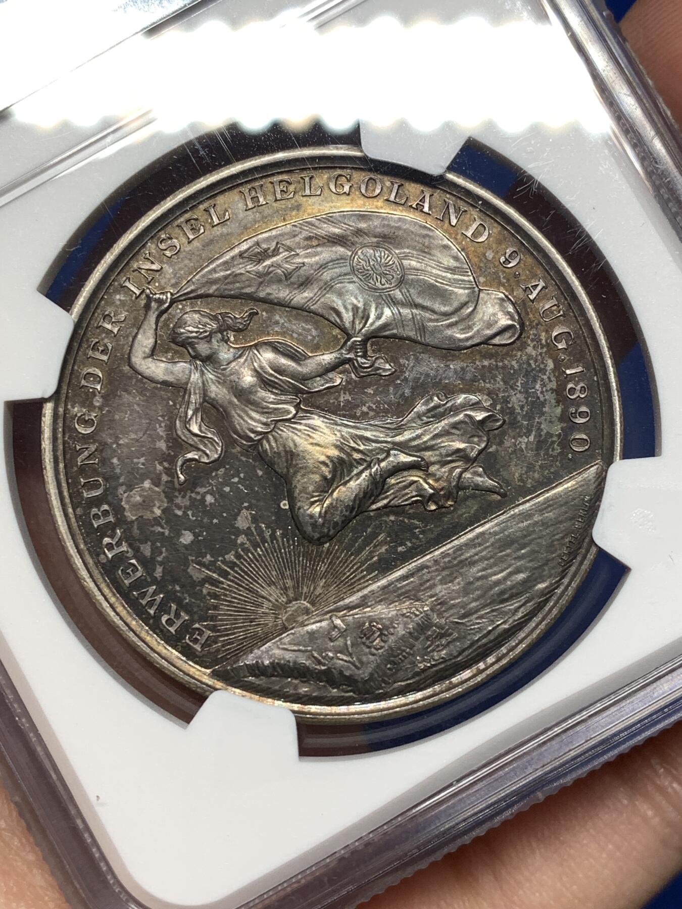 《竞宝斋》第478场 周日，周一 2场连拍 （全场包邮）欢迎送拍 NGC MS62 德国1890赫尔戈兰群岛纳入帝国版图纪念大银章 罕见品种 火烧云五彩镜面喷砂质感 38MM