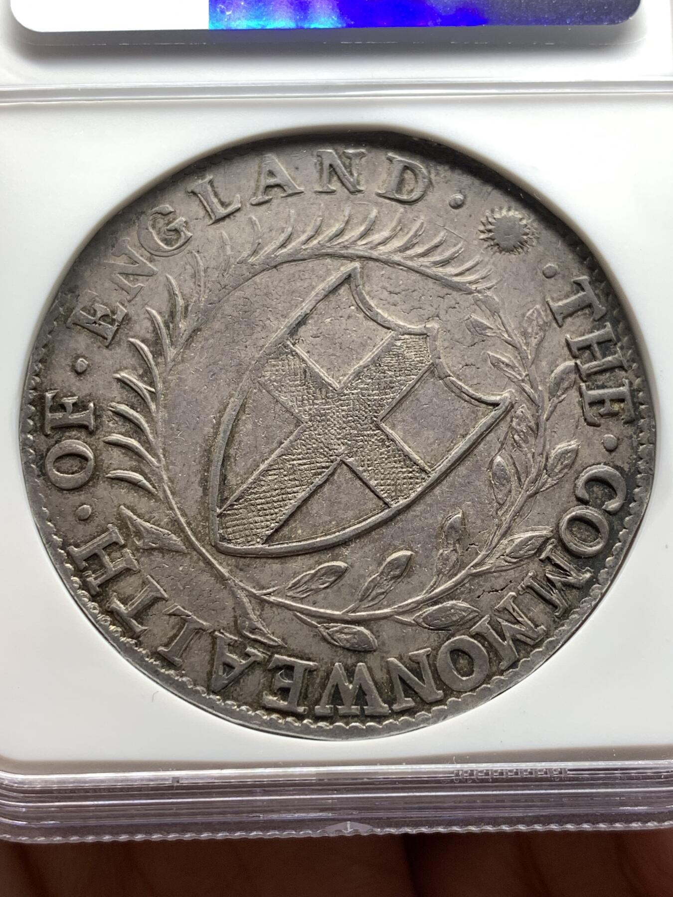 《竞宝斋》第478场 周日，周一 2场连拍 （全场包邮）欢迎送拍 NGC MS61 英国1656/4骑字commonwealth克朗，英国共和时期发行，少有的几种没有君主头像的英国钱币，大名誉品，最近成交感觉有锉痕的拍卖7200刀 本次的这枚明显好很多