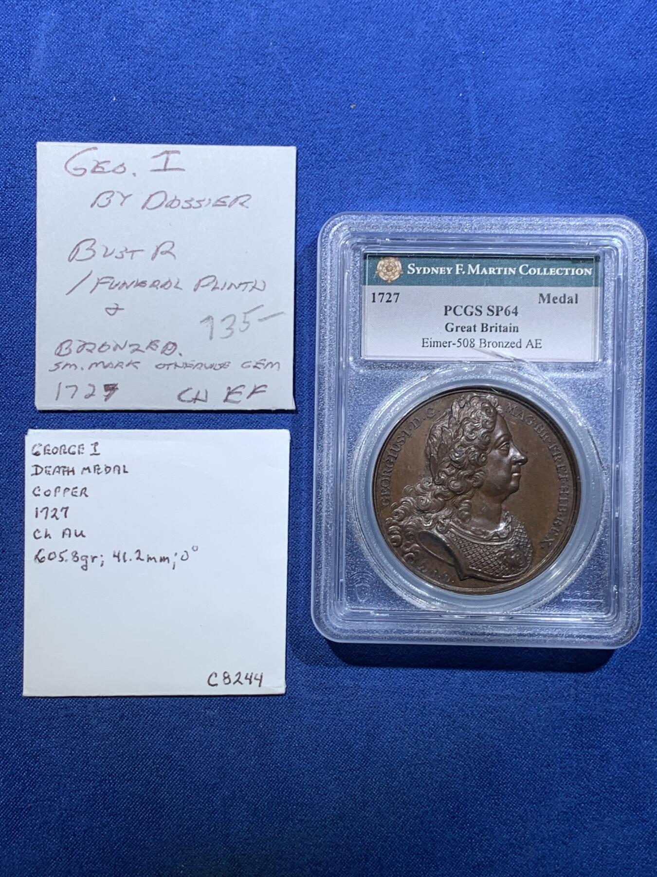 《竞宝斋》第478场 周日，周一 2场连拍 （全场包邮）欢迎送拍 PCGS SP64 英国1727年乔治一世国王逝世原铸大铜章，F.Martin名家旧藏，专属特殊封装。极少见的英系早期原铸，细节极精美，同时期章牌的顶尖水准。盒子内部有裂，细节见图。附纸袋标签，传承有序