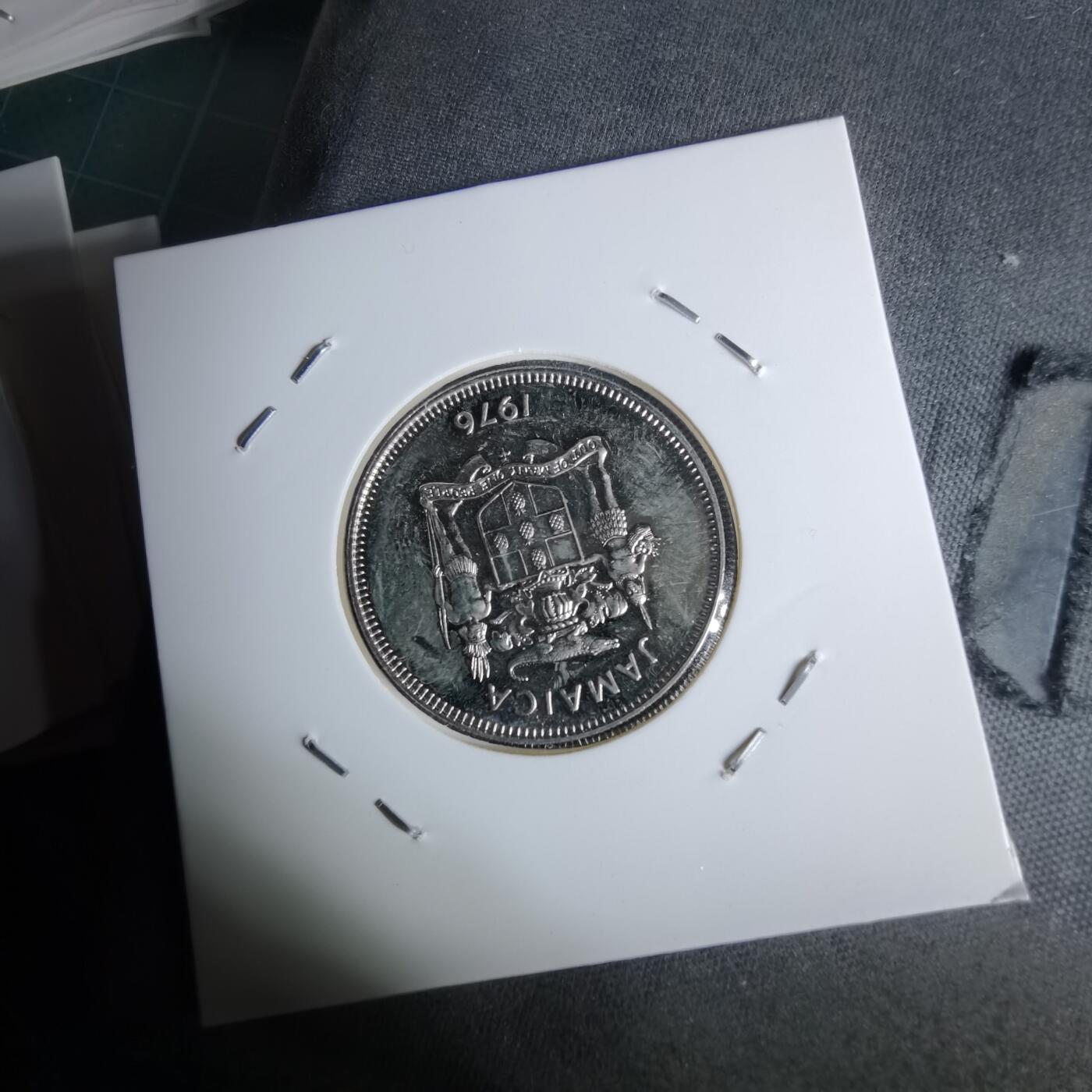 沼泽如烟--第1044场 牙买加1976年十分精制币