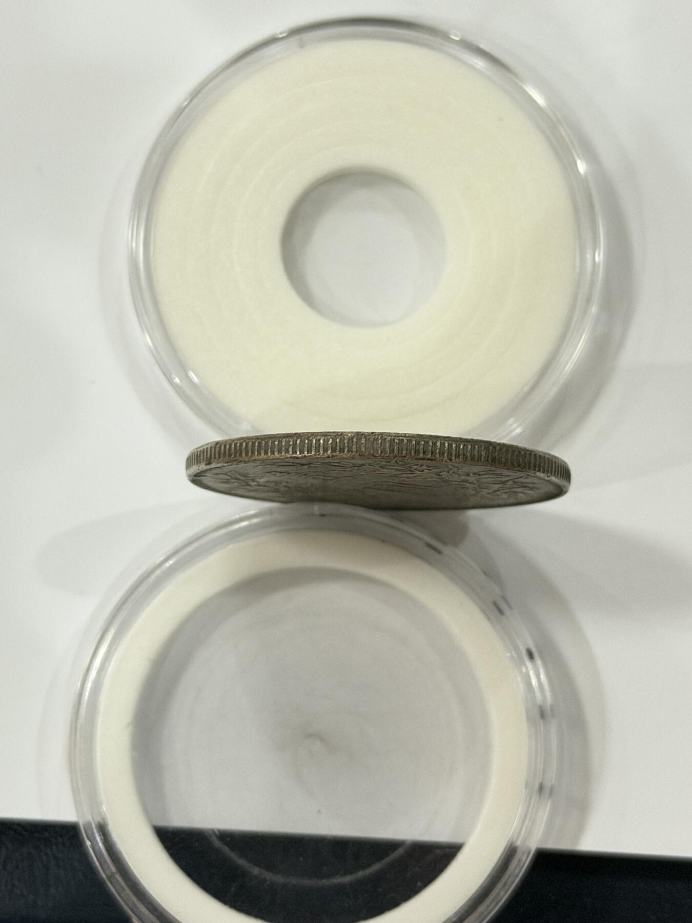 海外回流精品拍卖（机制币） 袁像壹圆（十年，带底光，保真）