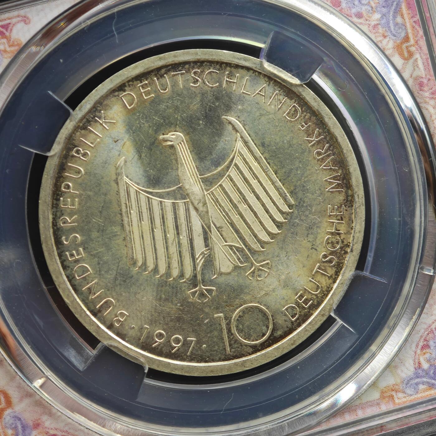 4月8日结束，成斌徽章钱币专场 众诚评级1997年德国柴油发明机100周年10马克银币15.5g