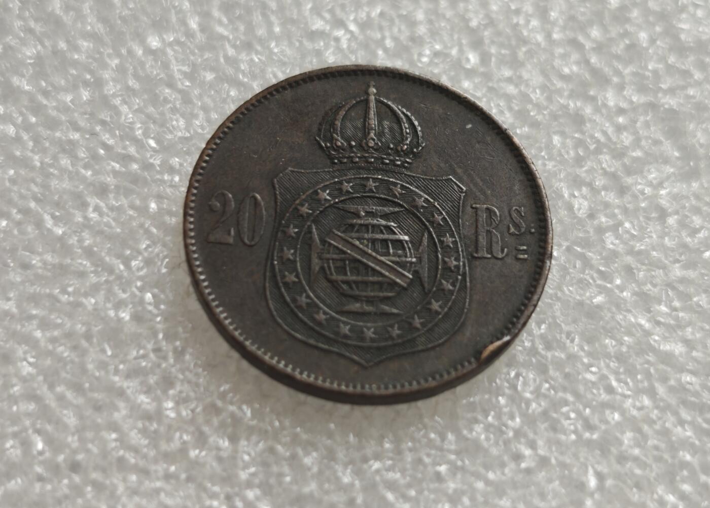 瓶子🏺第236期拍卖会  巴西帝国佩德罗二世20瑞斯铜币（1869年） 巴西帝国时期（1822–1889）佩德罗二世（Pedro II）统治下发行的20 Reis（瑞斯）铜币，铸造年份为1870年 拉丁文 PETRUS II D. G. C. IMP. ET PERP. BRAS. DEF.，意为“佩德罗二世，蒙神之恩，巴西皇帝及永久捍卫者”