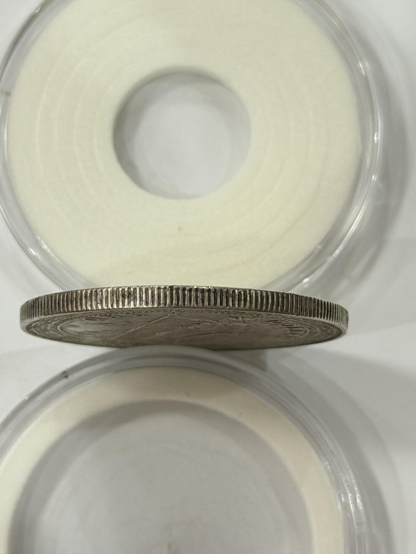 海外回流精品拍卖（机制币） 站人银币（1911年，保真）