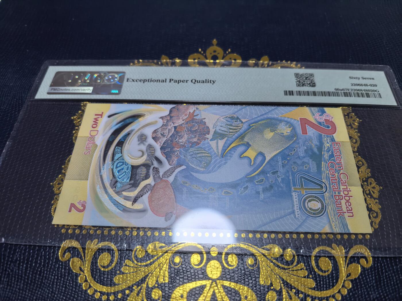 长老汇马年精选第十六场拍卖 获奖币！2023东加勒比央行成立40周年2元纸钞，PMG 67，无47