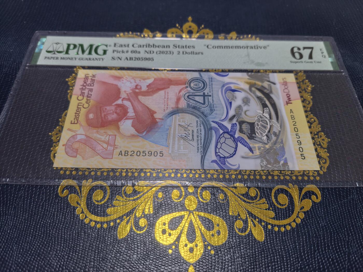 长老汇马年精选第十六场拍卖 获奖币！2023东加勒比央行成立40周年2元纸钞，PMG 67，无47