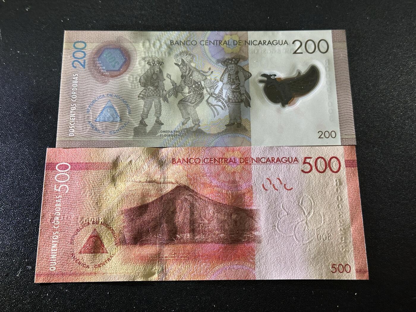 《外钞收藏家》第六百二十五期（精选场）（长期征集拍品、欢迎藏友们联系合作） 尼加拉瓜200和500面额 2张一起 全新UNC 无47