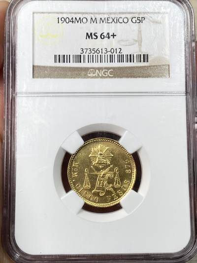 万国钱币拍卖第065期 - NGC MS64+ 1904年墨西哥天平鹰5比索金币 发行量仅1415枚的天平金鹰 墨西哥城造币厂铸 全深打车轮金光顶级BU收藏品质 8.46G 875金