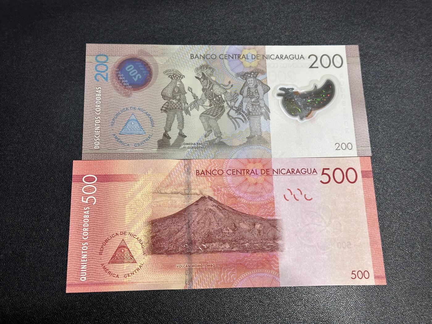 《外钞收藏家》第六百二十五期（精选场）（长期征集拍品、欢迎藏友们联系合作） 尼加拉瓜200和500面额 2张一起 全新UNC 无47