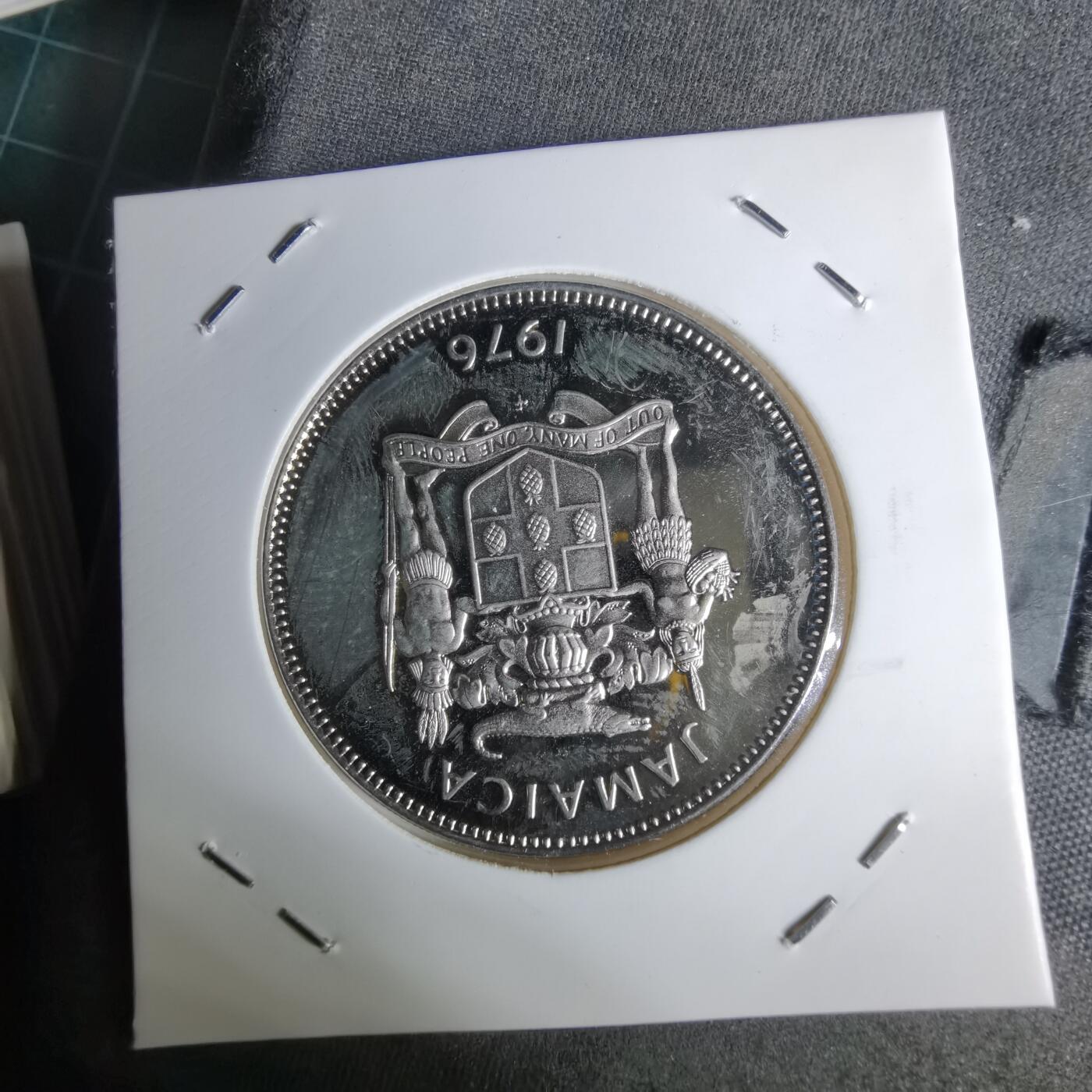 沼泽如烟--第1044场 牙买加1976年25分精制币