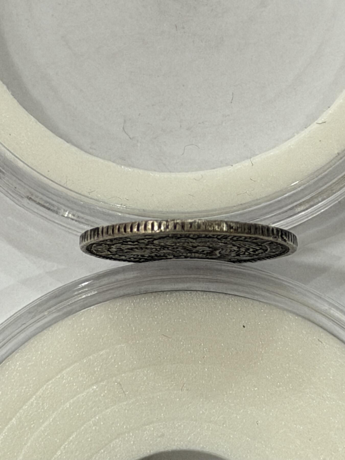 海外回流精品拍卖（机制币） 东三省造光绪七分二厘（有小磕如图，保真）