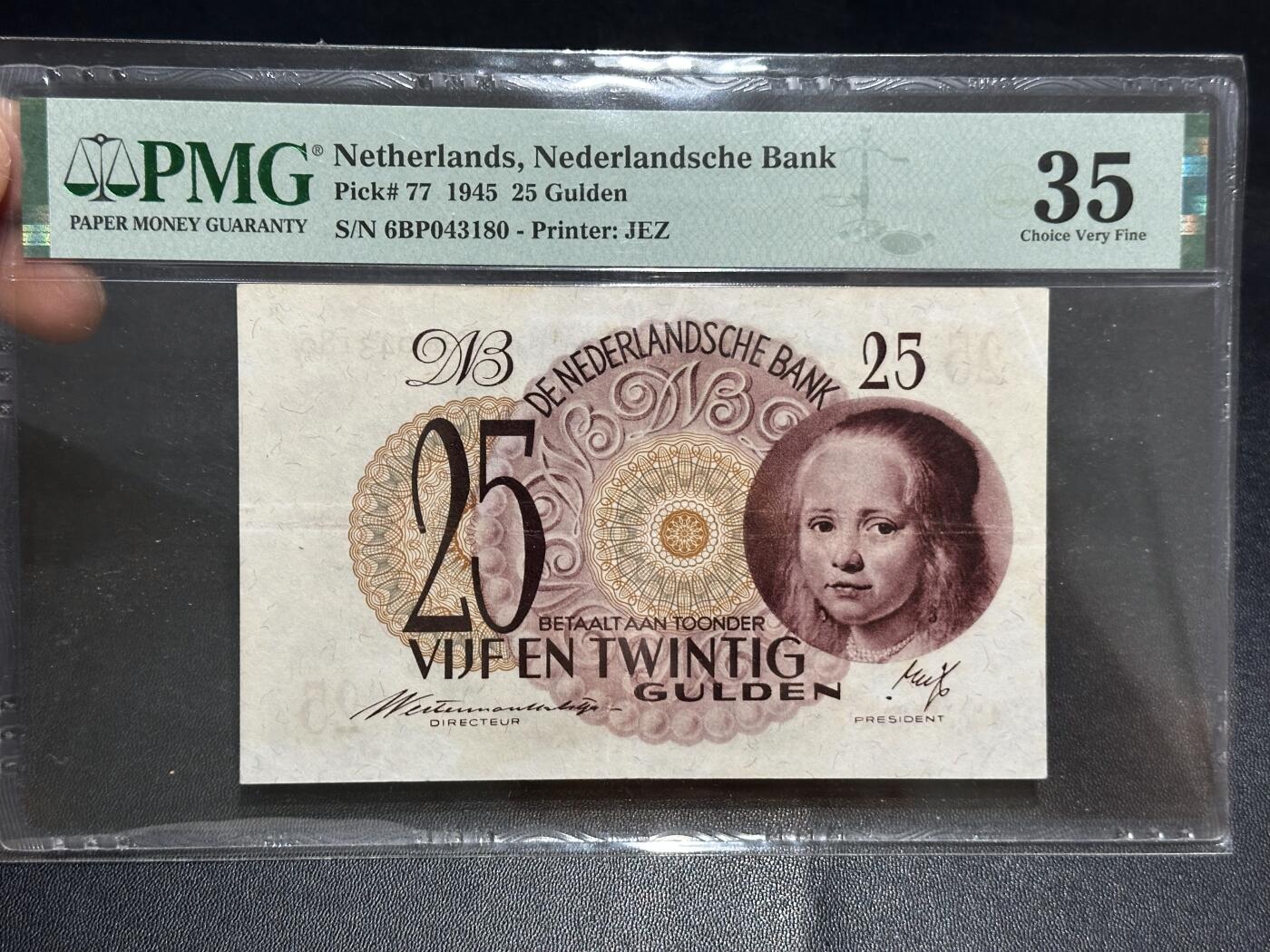《外钞收藏家》第六百二十五期（精选场）（长期征集拍品、欢迎藏友们联系合作） 1945年荷兰25盾 （经典小女孩）PMG35 少见版本